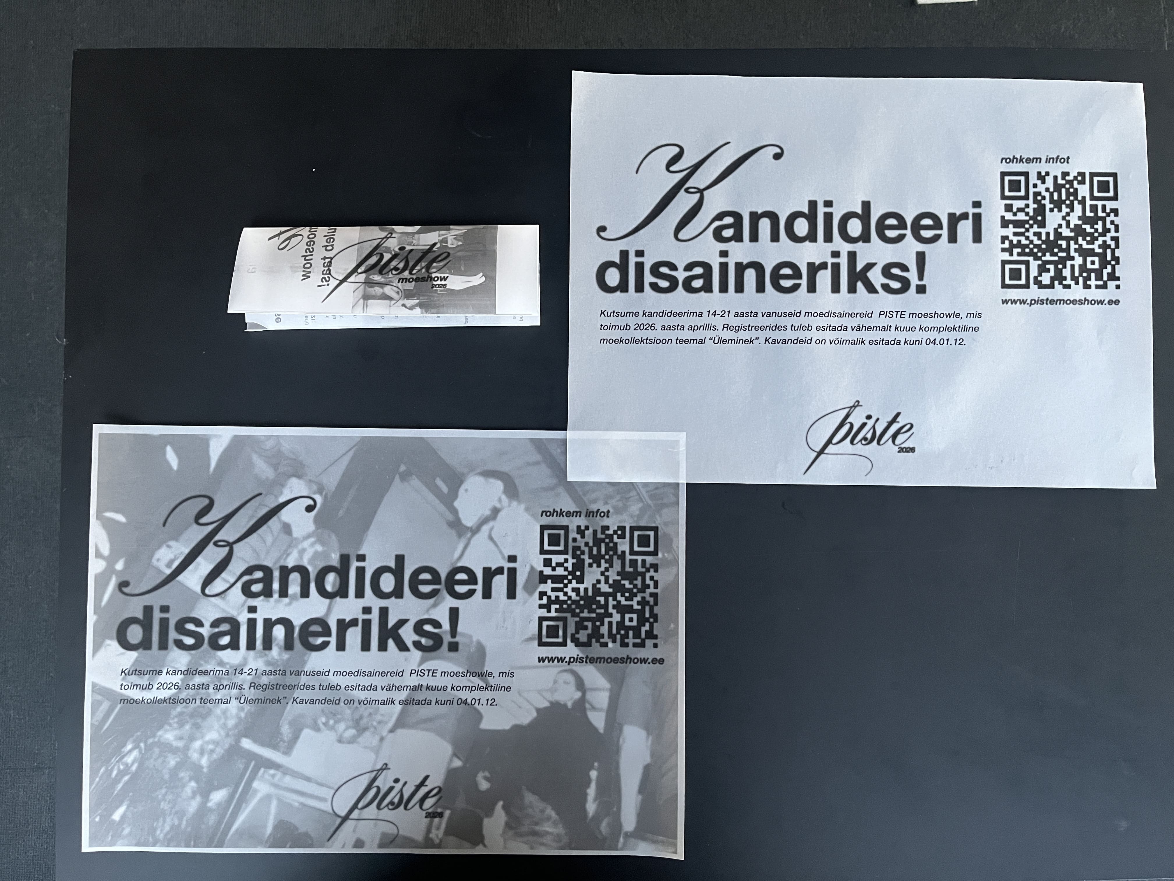 Posters and leaflet on table